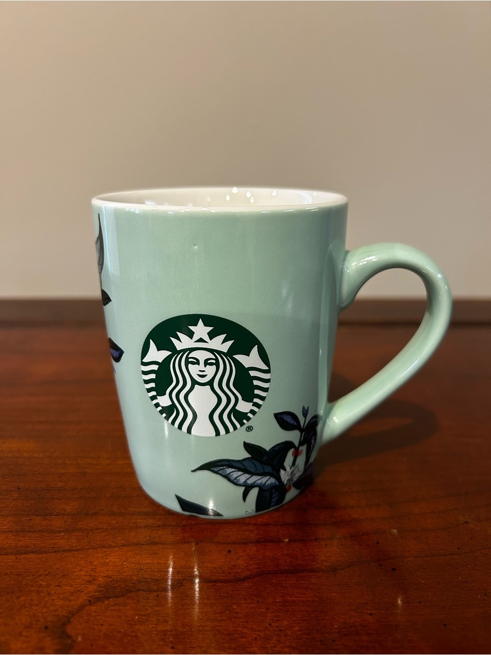 Starbucks Sage Green Ceramic Mug with Floral Accent. 10 oz.